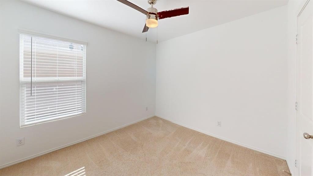 5970 Wedgemere Drive Princeton, TX 75407 - Photo 5 of 17 a view of a room that has a window in it