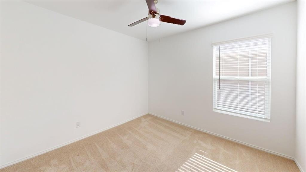 5970 Wedgemere Drive Princeton, TX 75407 - Photo 8 of 17 an empty room with a window