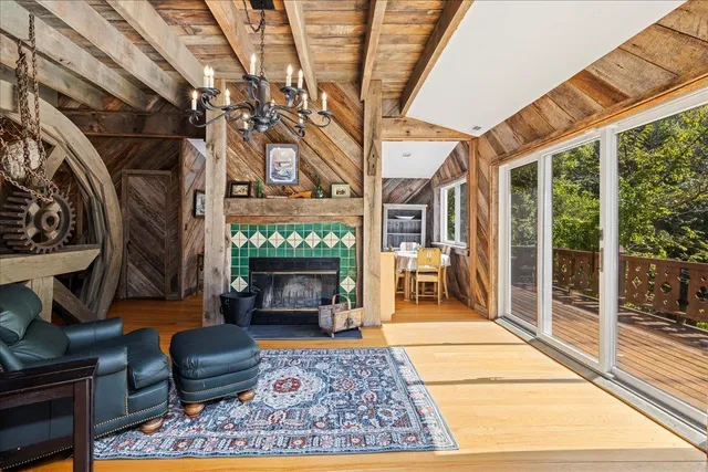 a view of balcony with wooden floor