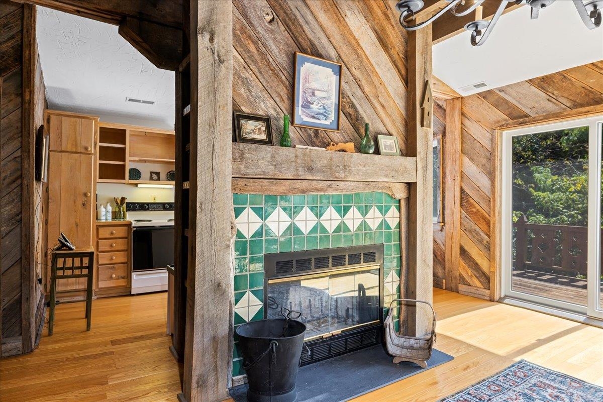 6602 Middlebrook Road Raphine, VA 24472 - Photo 21 of 68 a front view of a building with a garden and seating area