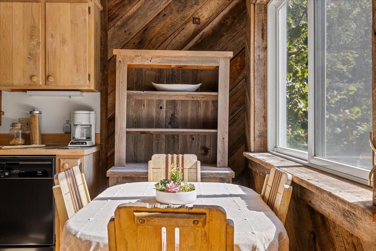 6602 Middlebrook Road Raphine, VA 24472 - Photo 26 of 68 a dining room with furniture a window and wooden floor