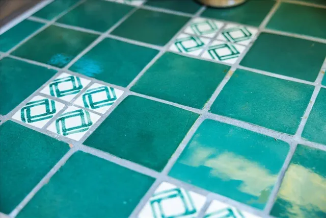 a view of a room with wooden floor and furniture