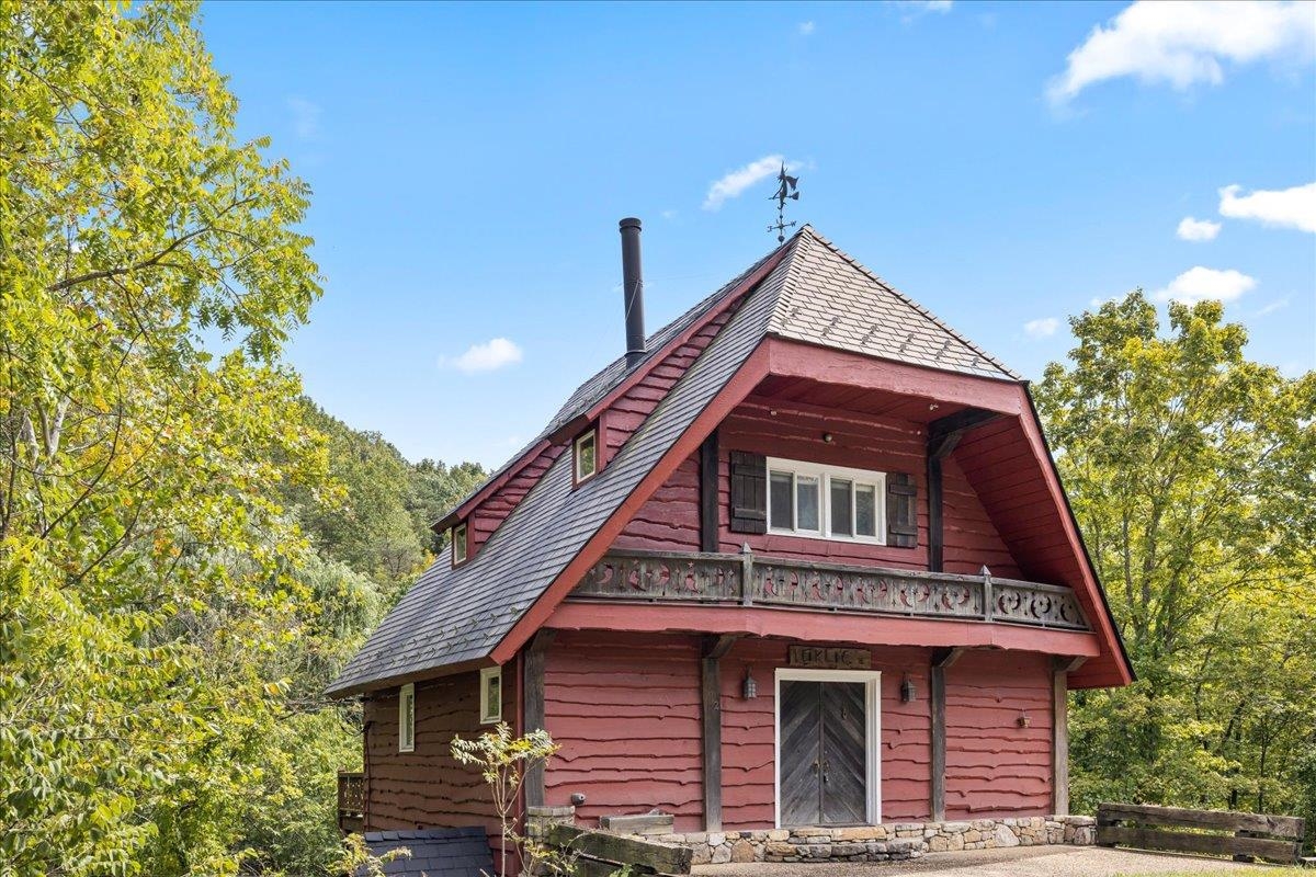 6602 Middlebrook Road Raphine, VA 24472 - Photo 6 of 68 a front view of a house with a yard