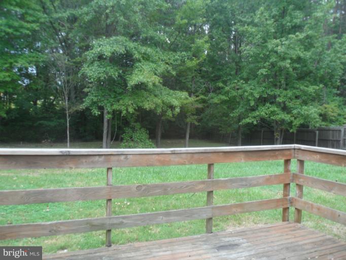 137 Choptank Road Stafford, VA 22556 - Photo 2 of 9 a view of backyard with green space