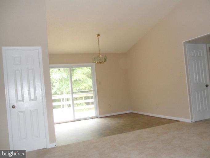137 Choptank Road Stafford, VA 22556 - Photo 3 of 9 a view of an empty room with a window