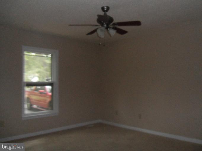 137 Choptank Road Stafford, VA 22556 - Photo 4 of 9 an empty room with a window