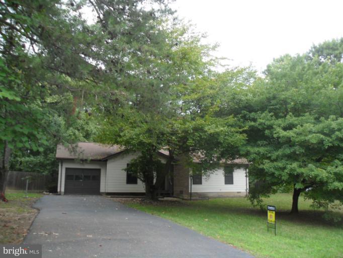 137 Choptank Road Stafford, VA 22556 - Photo 9 of 9 a view of a house with a garden