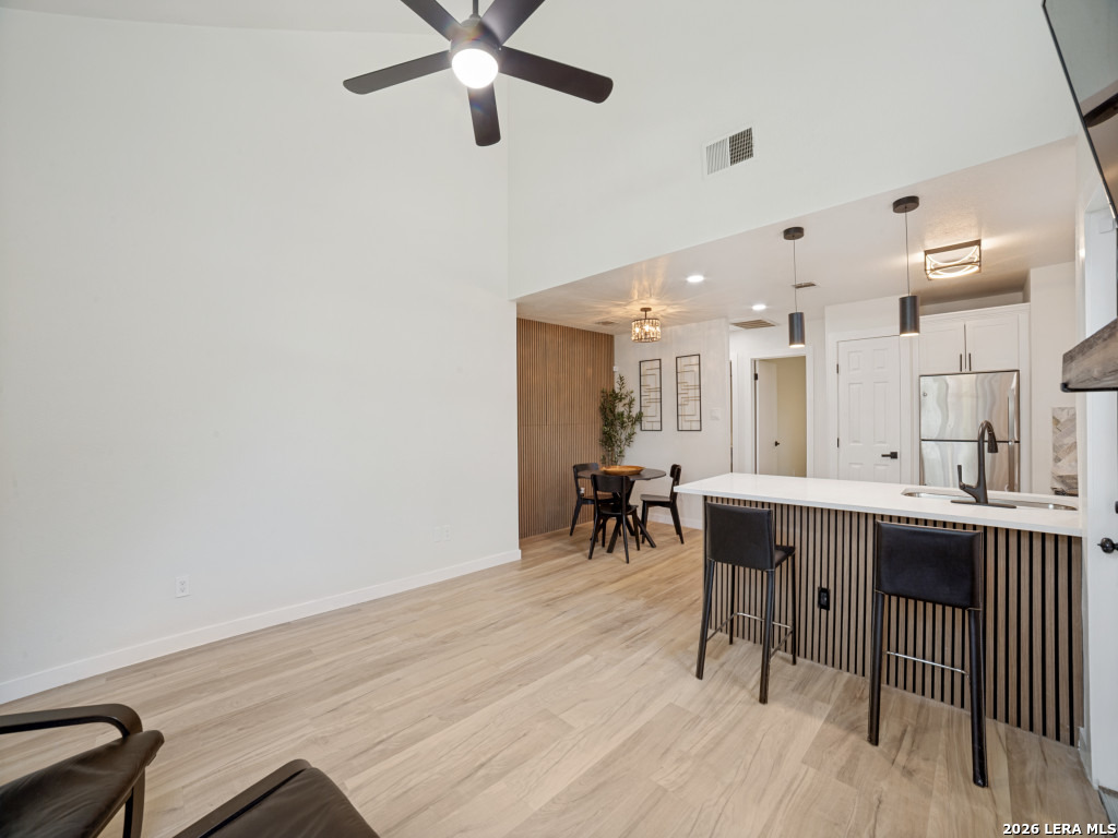 3439 Ridge Ranch San Antonio, TX 78247 - Photo 6 of 25 a view of a room with furniture and a chandelier
