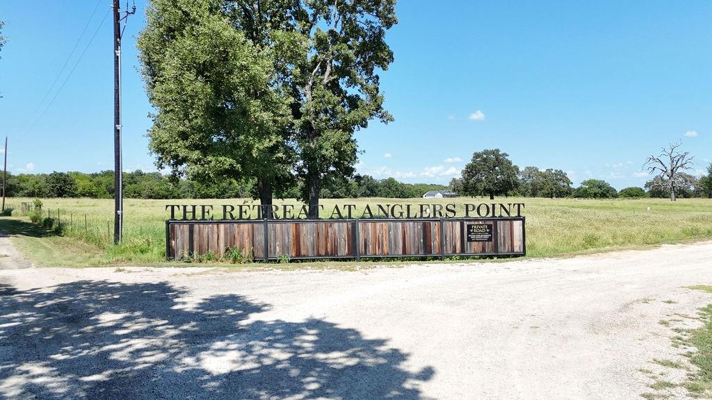 a view of swimming pool with a backyard