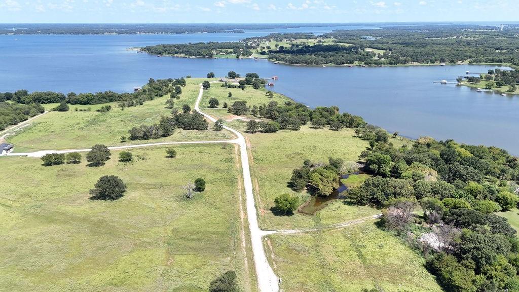 Lot 49 Anglers Point Drive Emory, TX 75440 - Photo 12 of 15 a view of a lake with a mountain in the background