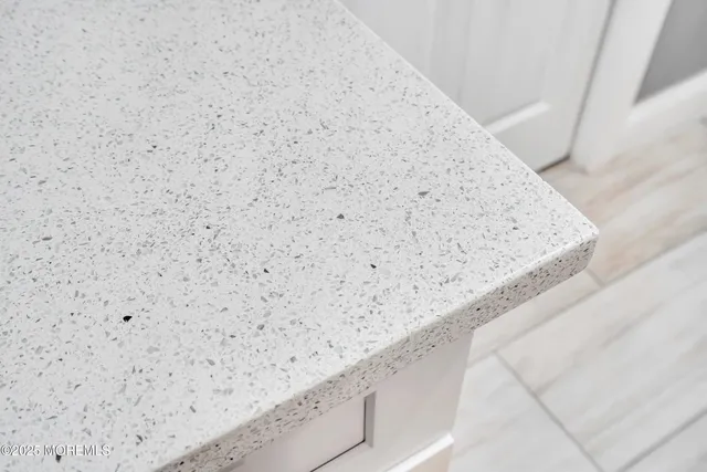 a view of wooden floor in a bathroom