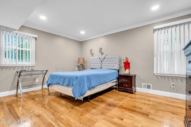 a bedroom with a bed and a table in it