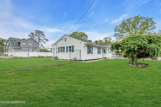 a view of a house with a big yard