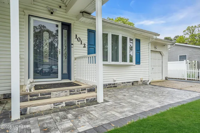 a view of a entryway door front of house
