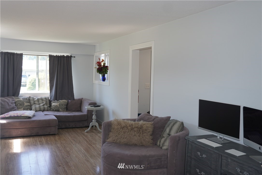 1507 South Machias Road Snohomish, WA 98290 - Photo 13 of 22 a living room with furniture and a flat screen tv