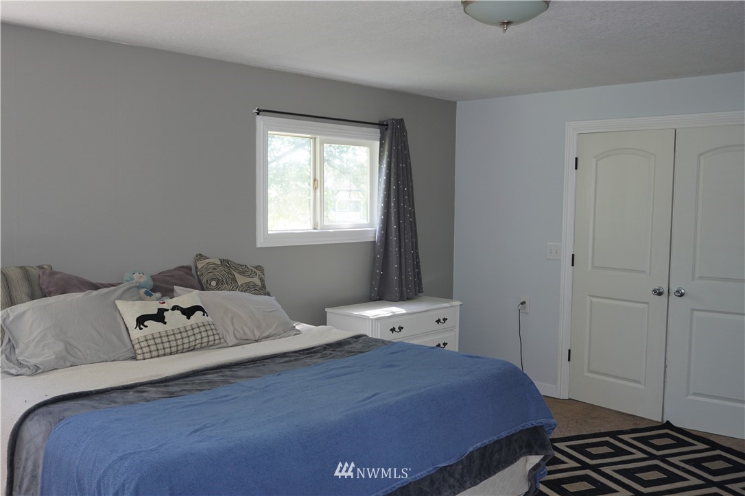 1507 South Machias Road Snohomish, WA 98290 - Photo 17 of 22 a bedroom with a bed and window