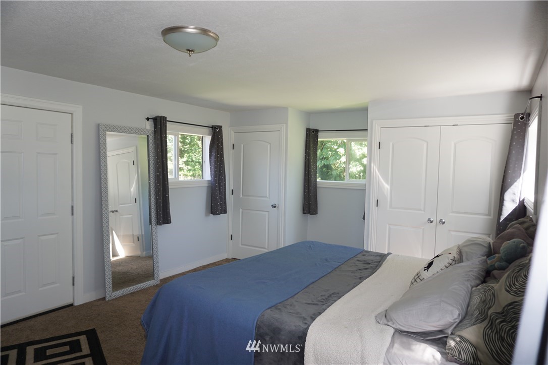 1507 South Machias Road Snohomish, WA 98290 - Photo 18 of 22 a bedroom with a bed and a window