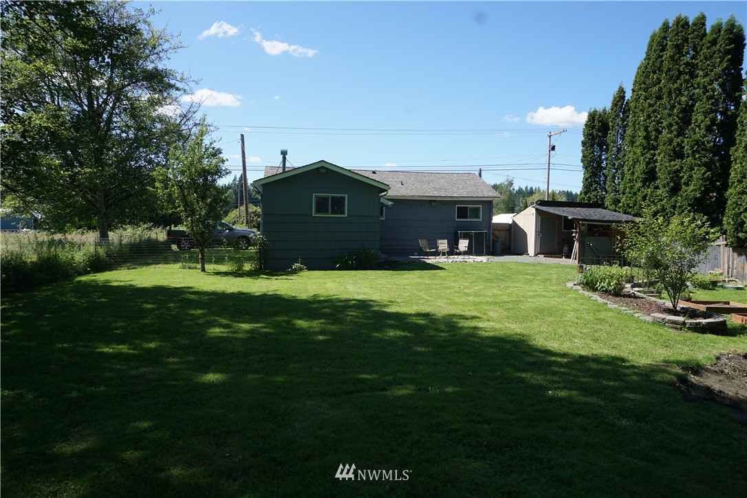 1507 South Machias Road Snohomish, WA 98290 - Photo 6 of 22 a view of a house with a yard