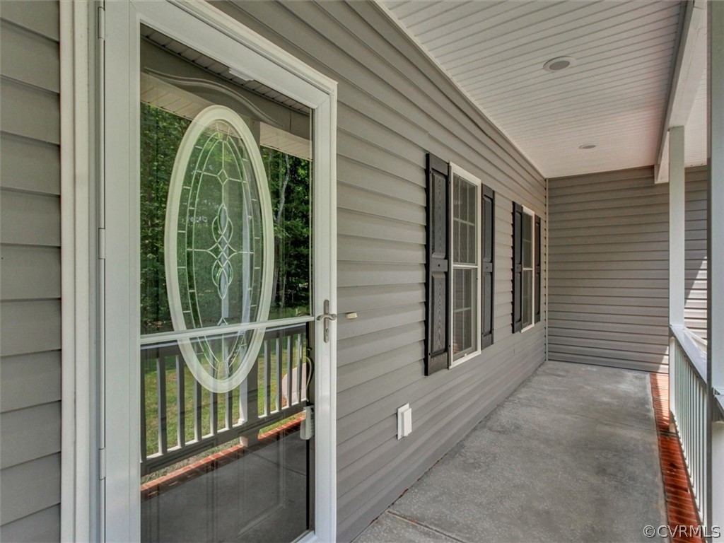 4720 Powhatan Lakes Road Powhatan, VA 23139 - Photo 5 of 35 Front sitting concrete front porch with maintenanc