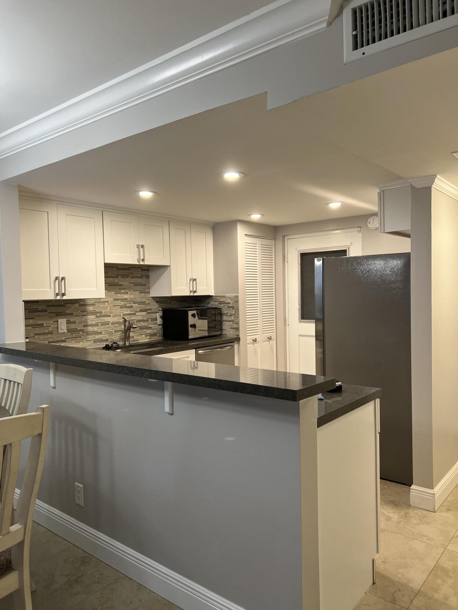 5700 Northwest 2nd Avenue, Unit 412 Boca Raton, FL 33487 - Photo 2 of 17 KITCHEN DISTANCE