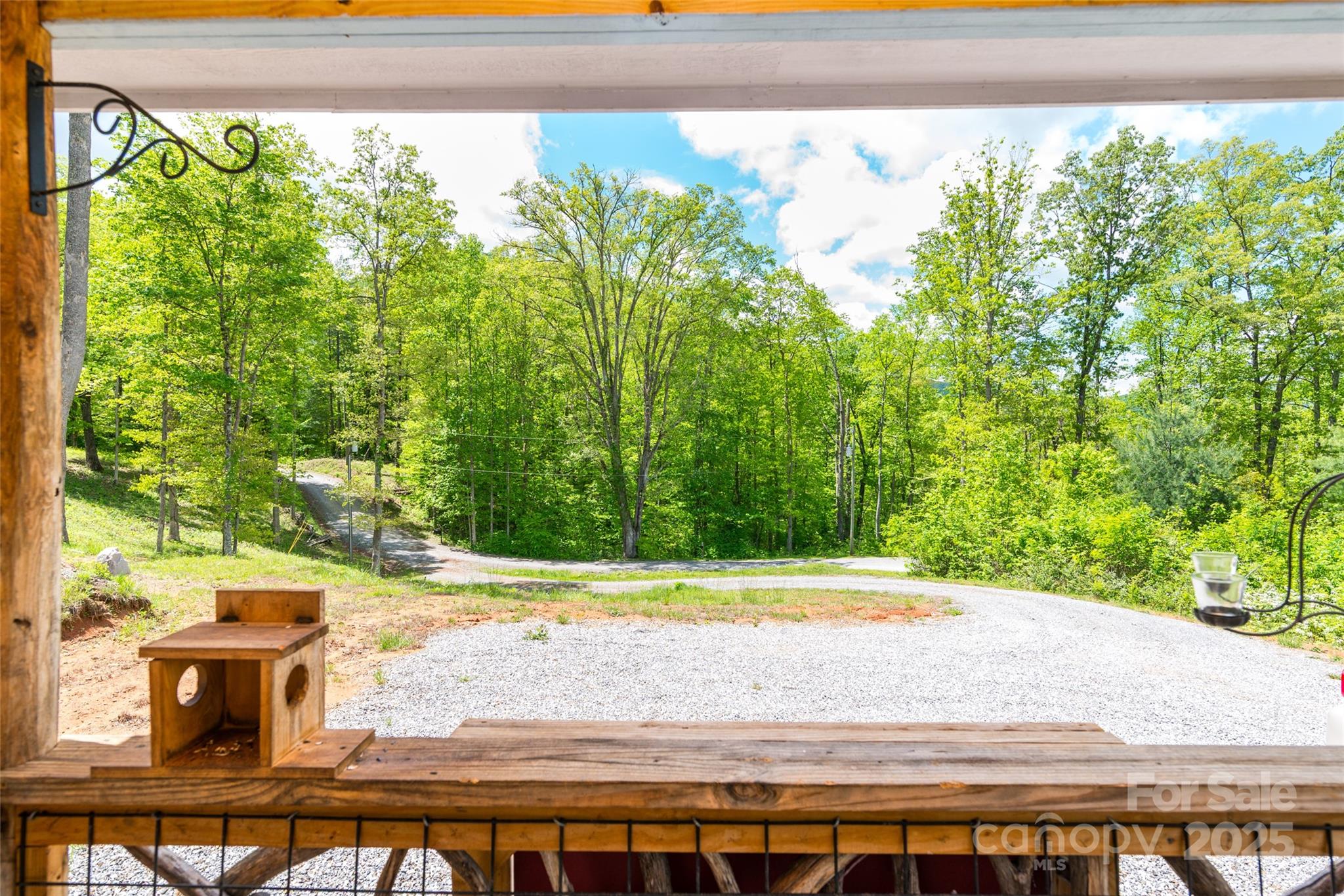 720 Cedar Creek Farm Road Tuckasegee, NC 28783 - Photo 19 of 19 a view of a yard with a street