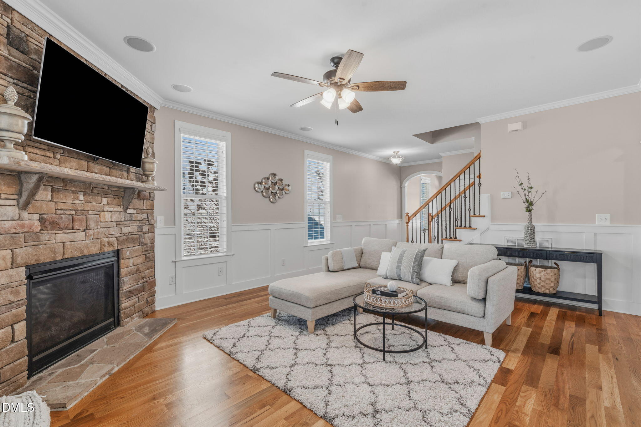 7320 Bedford Ridge Drive Apex, NC 27539 - Photo 12 of 64 a living room with furniture fireplace and flat screen tv