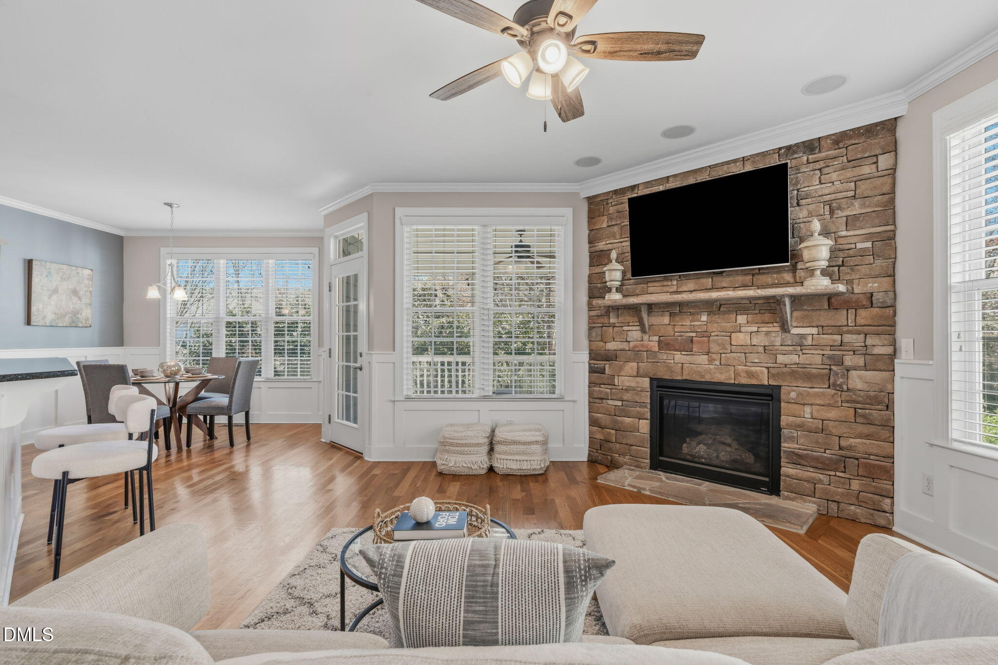 7320 Bedford Ridge Drive Apex, NC 27539 - Photo 13 of 64 a living room with furniture fireplace and flat screen tv