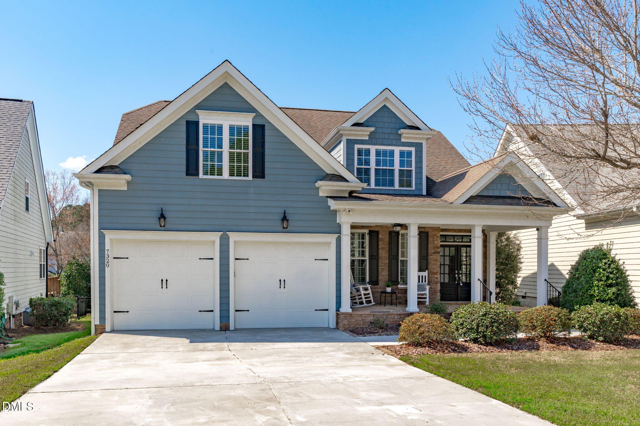 7320 Bedford Ridge Drive Apex, NC 27539 - Photo 2 of 64 a view of a yard in front view of a house