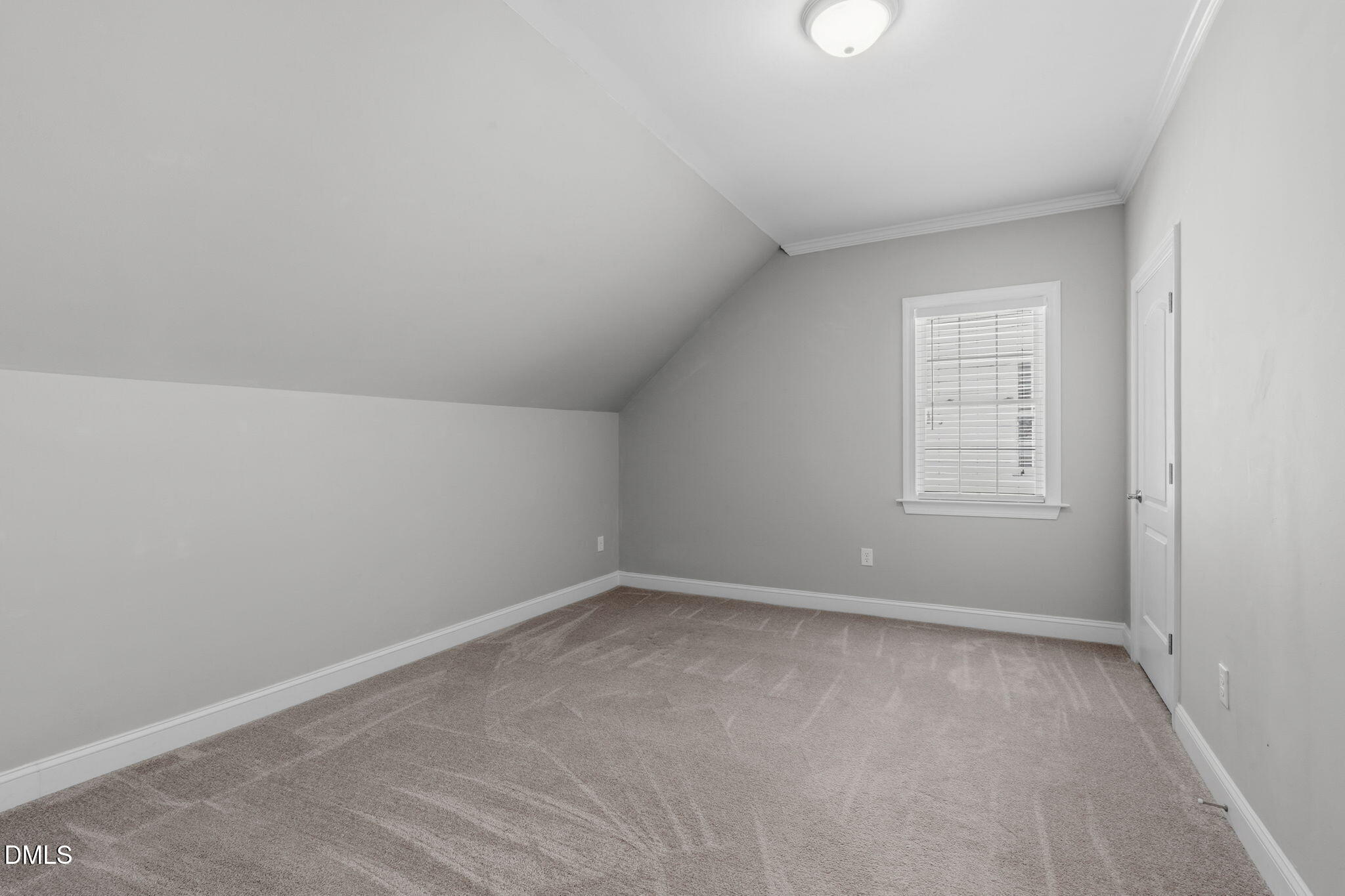 7320 Bedford Ridge Drive Apex, NC 27539 - Photo 36 of 64 an empty room with a window