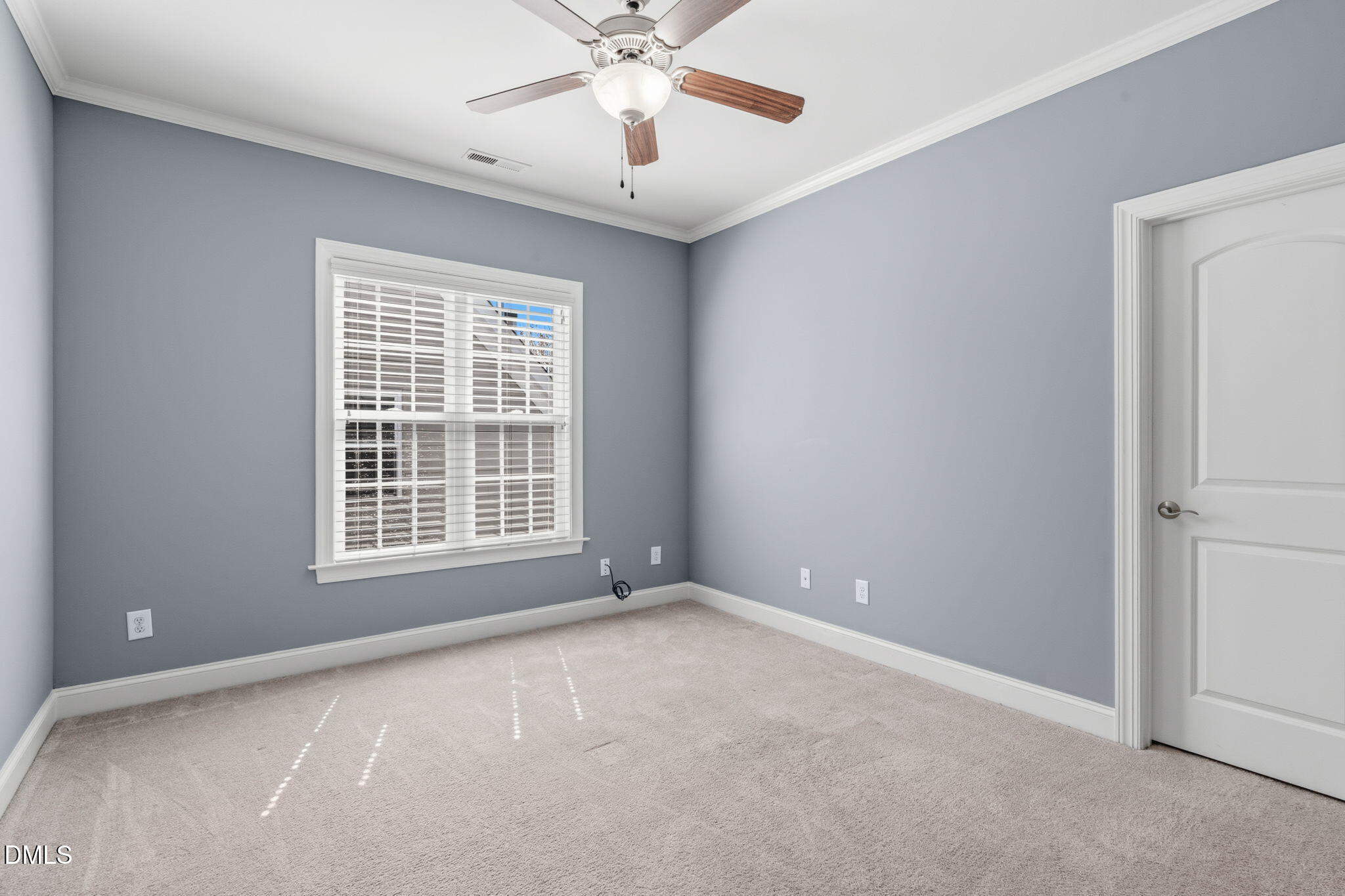 7320 Bedford Ridge Drive Apex, NC 27539 - Photo 43 of 64 a view of an empty room with a window