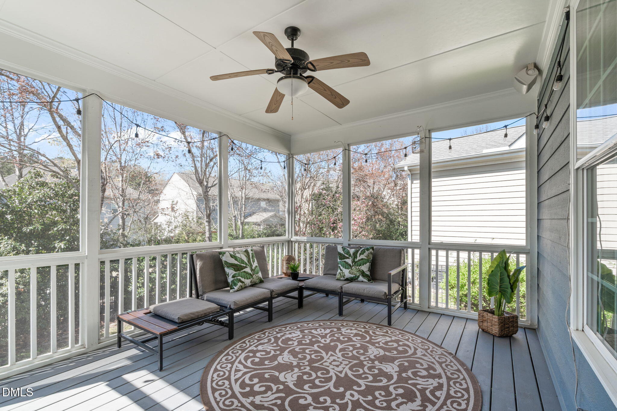 7320 Bedford Ridge Drive Apex, NC 27539 - Photo 49 of 64 a living room with furniture and a large window