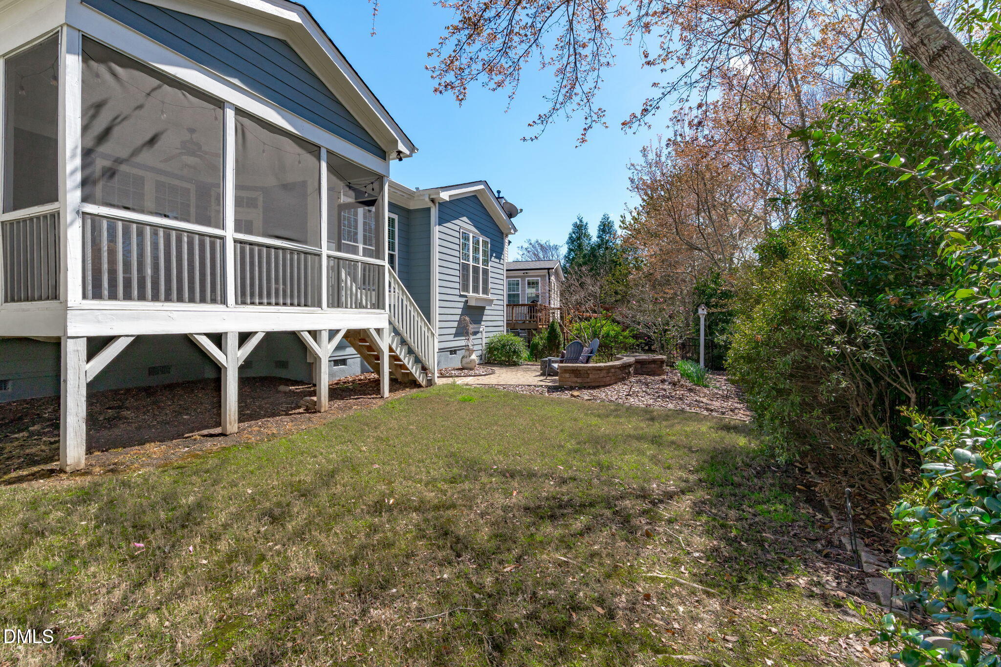 7320 Bedford Ridge Drive Apex, NC 27539 - Photo 52 of 64 a view of a house with backyard and sitting area