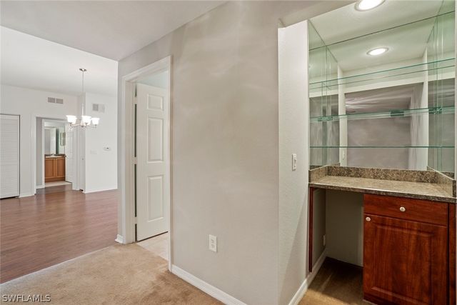 a view of a room with racks on the wall