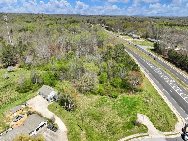 a view of a yard with an outdoor space