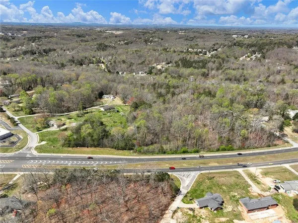a view of a yard with an outdoor space