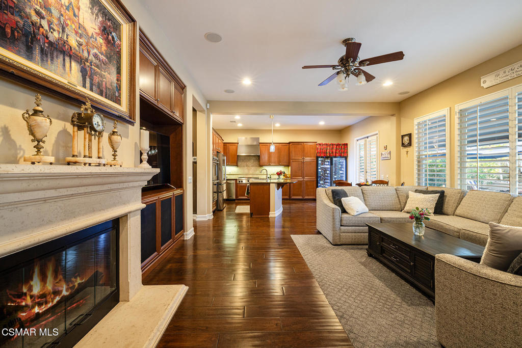 5019 Corral Street Simi Valley, CA 93063 - Photo 12 of 50 a living room with furniture and a fireplace