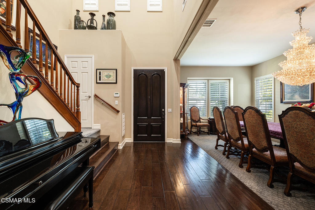 5019 Corral Street Simi Valley, CA 93063 - Photo 7 of 50 a living room with wooden floor furniture and stairs