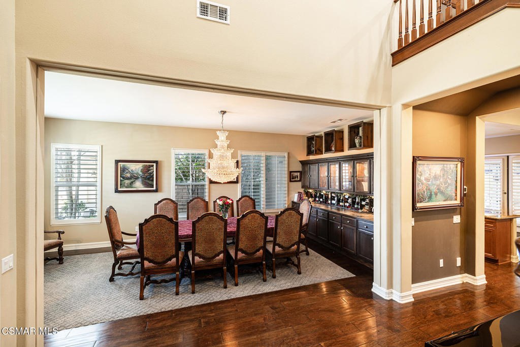 5019 Corral Street Simi Valley, CA 93063 - Photo 8 of 50 a view of a dining room with furniture window and wooden floor