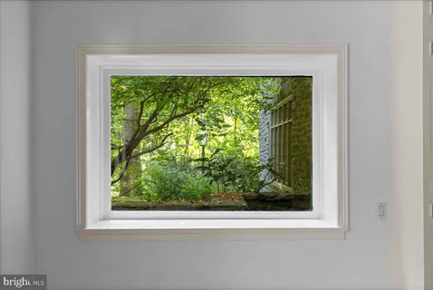 a kitchen with stainless steel appliances granite countertop a stove and a refrigerator