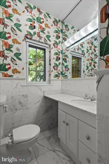 a view of an entryway with a hardwood