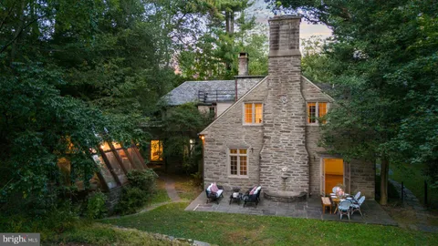a view of a patio with table and chairs