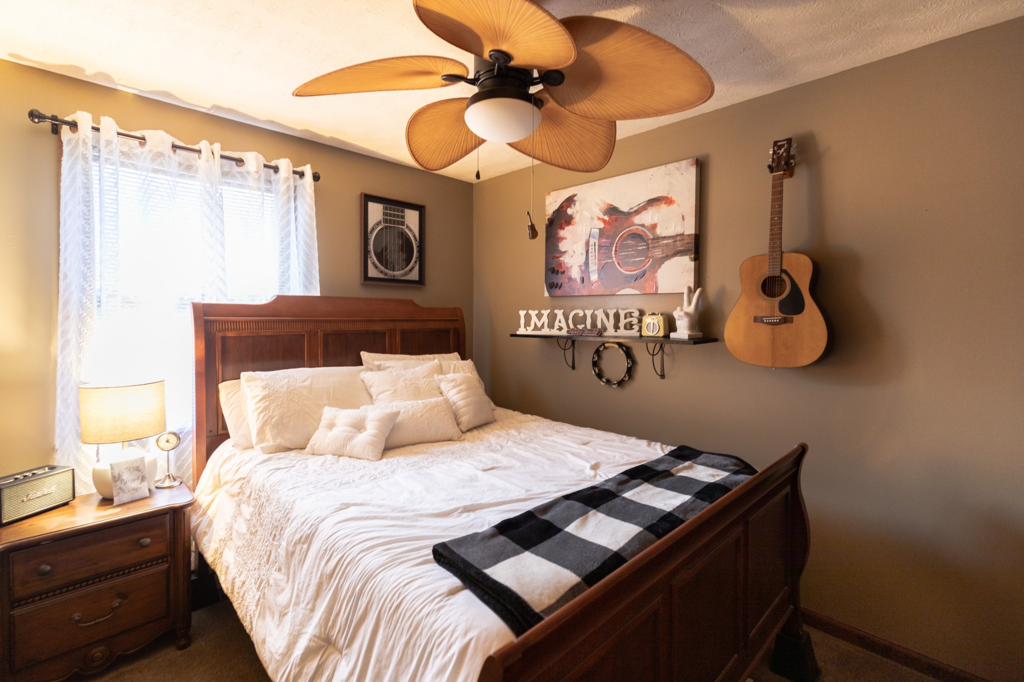 2004 Cherokee Trail Springfield, TN 37172 - Photo 20 of 38 a bedroom with a bed and a chandelier