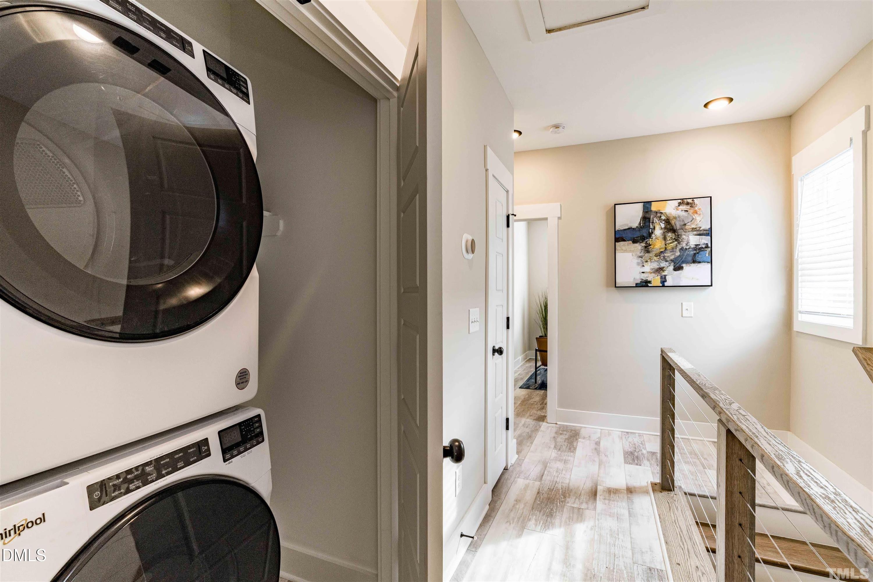 4201 Convergence Street Durham, NC 27704 - Photo 28 of 35 a view of a hallway with washer and dryer