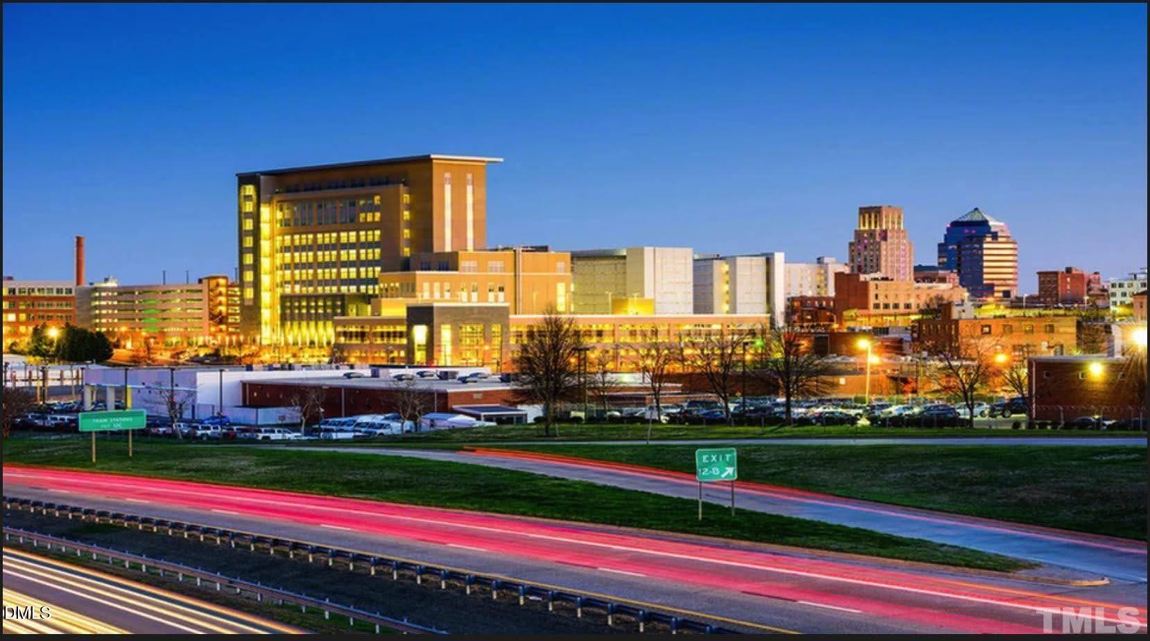 4201 Convergence Street Durham, NC 27704 - Photo 34 of 35 a view of a city with tall buildings