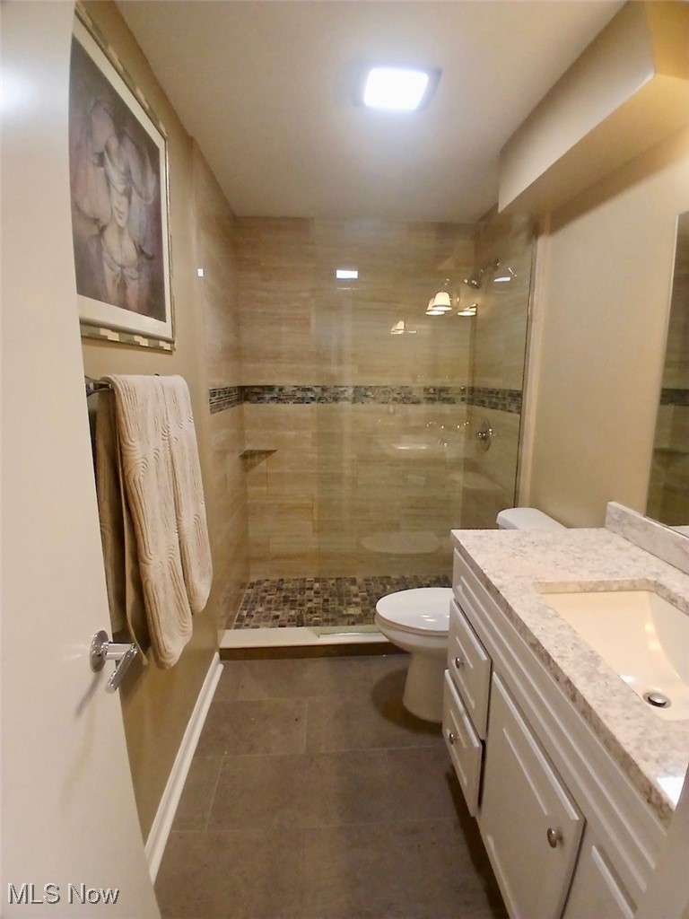 1685 Fattler Ridge Road Philo, OH 43771 - Photo 13 of 24 Bathroom featuring vanity and a shower stall