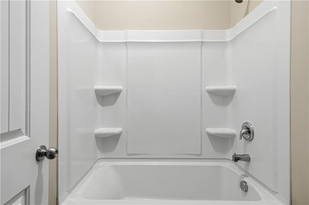 114 Madison Street Canton, GA 30115 - Photo 32 of 39 a bathroom with a shower