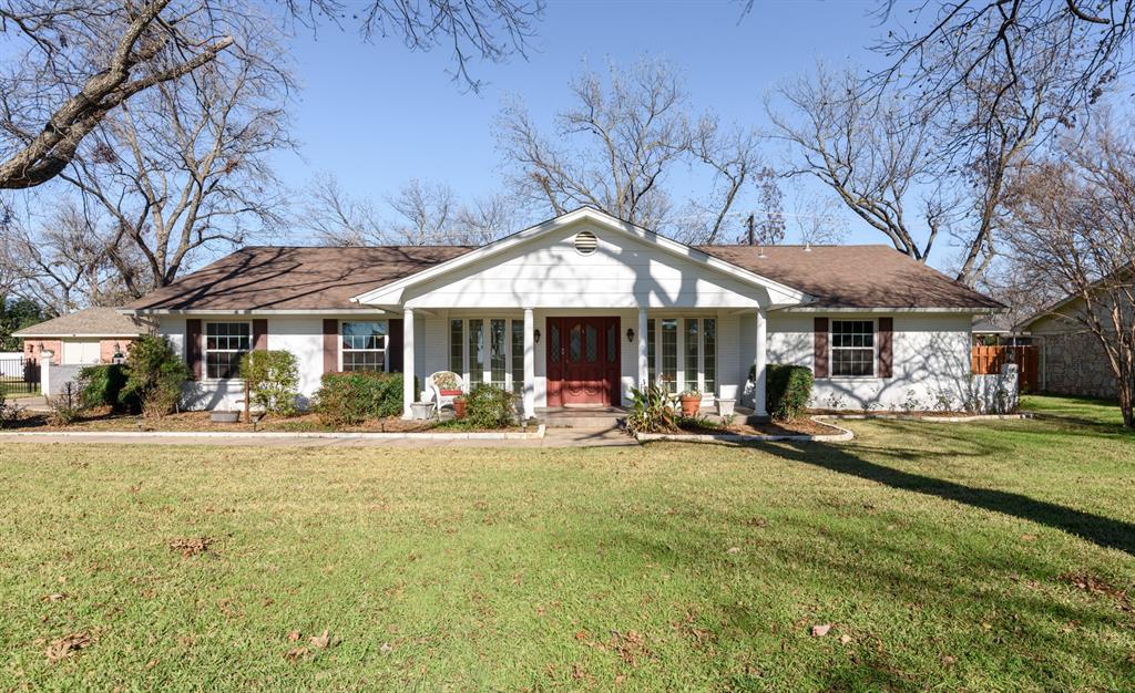 5110 Wedgefield Road Granbury, TX 76049 - Photo 1 of 1 a front view of a house with swimming pool and porch with furniture