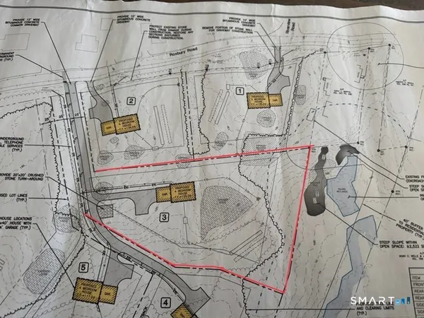 a utility room with a utility and a sink