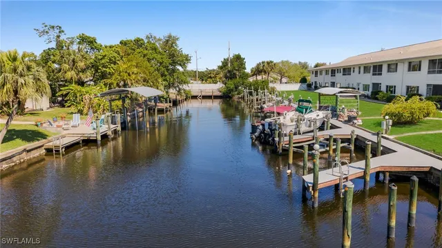 a view of swimming pool with outdoor seating
