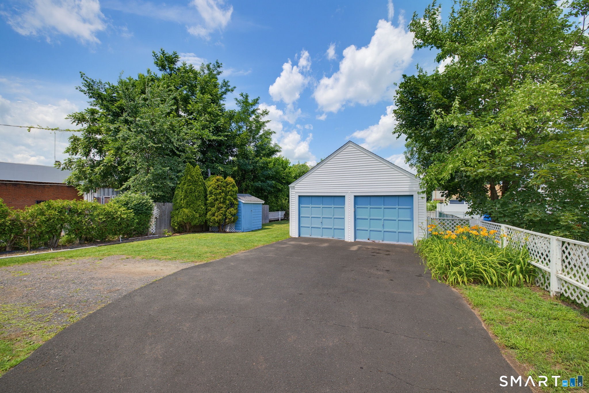 417 Hartford Road Manchester, CT 06040 - Photo 34 of 38 In addition to the paved driveway, there is a turn around making it easy to pull into and out of the driveway.